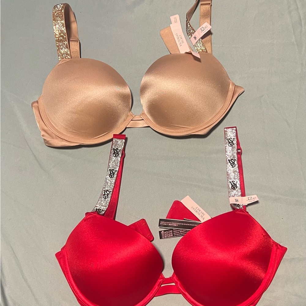 Tan and red Victoria secret bras with rhinestone straps